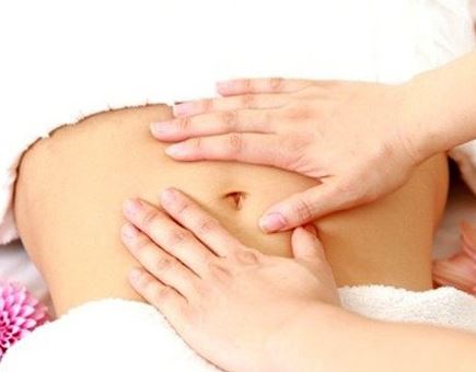 Dùng tinh dầu massage để giảm béo bụng